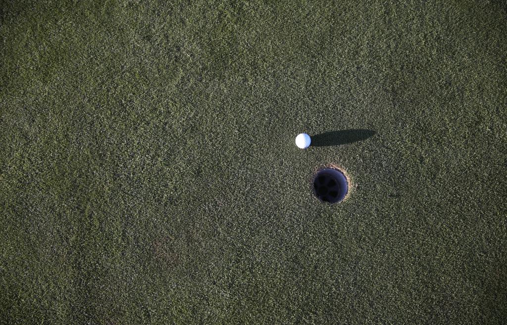 bird's eye view of golf ball near hole